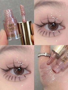 Detail view of shimmering pink liquid eyeshadow with swatches and professional eye makeup look