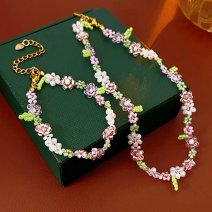 Handmade beaded flower necklace and bracelet set in pink and green holiday style