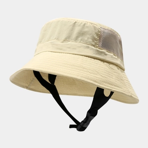 Detail of breathable mesh side panels and adjustable chin strap on a beige sun bucket hat