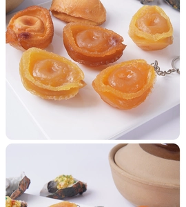 Macro detail of realistic faux abalone keychains with natural textures and metal rings
