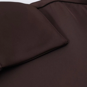 Macro view of dark brown satin shirt fabric showing high-quality twill texture and stitching