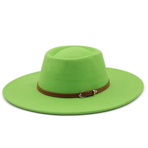 Detail of lime green wool felt hat featuring a decorative brown leather buckle band