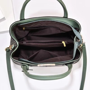 Internal view of a large printed tote bag with coffee fabric lining and zipper pockets