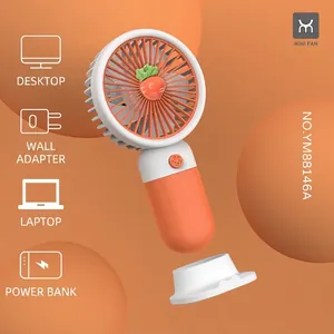 Mini ventilatore portatile design carota con base nei colori arancione e bianco
