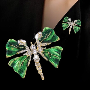 Elegant gold dragonfly brooch with green enamel wings and sparkling rhinestones for suits