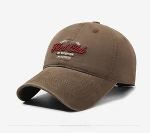 Detail of vintage brown cotton baseball cap featuring intricate multi-layer embroidery