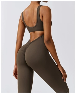 Detail of scrunch butt seam and back cutout on high-stretch yoga jumpsuit