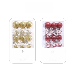 Detailed view of clear red and gold Christmas ball ornaments in rectangular box packaging