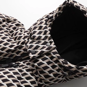 Detail of hooded winter jacket with geometric rhombus pattern and adjustable drawstring