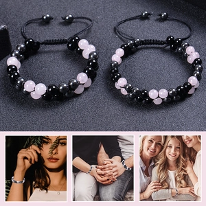 Detail of adjustable double-layer woven bracelet with pink quartz and black obsidian beads
