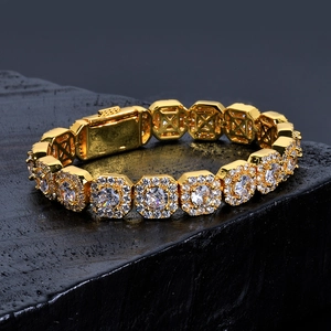 Detailed view of 10mm gold hip hop bracelet with square cubic zirconia and box clasp