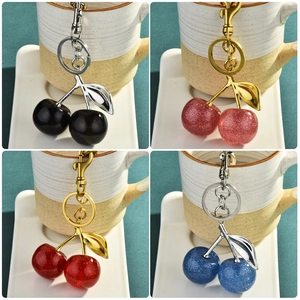 Sparkly cherry keychain with lobster clasp in four colors for handbags and car keys