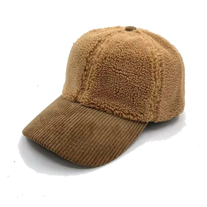 Thick autumn winter baseball cap in camel lamb wool and corduroy texture for warmth