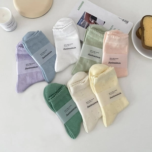 Set of 8 cute lace-edge cotton crew socks in pastel colors with mesh hollow-out design