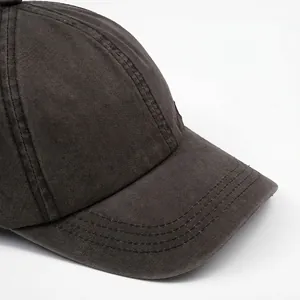 Washed cotton baseball cap for men featuring a wide brim and premium embroidery detail