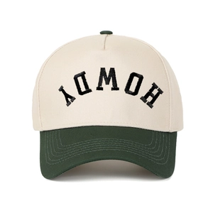 Retro two-tone baseball cap in beige and green with HOWDY embroidery on the front