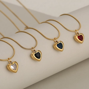 Minimalist stainless steel snake chain necklaces with crystal heart pendants in four colors