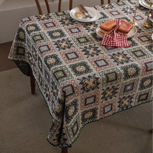 Colorful geometric mosaic jacquard tablecloth with bohemian woven patterns and green trim