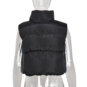 Rear view of black padded vest with a high stand collar on a transparent mannequin