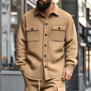 Detail view of khaki casual jacket showing button-down front and double chest pockets