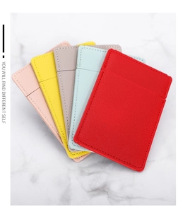 Close-up of minimalist card holders in five colors with premium pebble leather texture