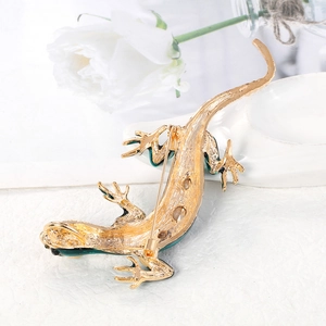 Broche lézard vintage dorée avec émail vert, vue arrière montrant le fermoir à épingle