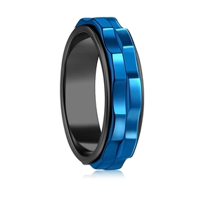 Macro shot of rotatable spinner ring with blue wave texture and smooth black inner band