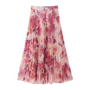 Gonna lunga a pieghe con stampa floreale rosa e arancione per un perfetto stile vacanza