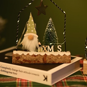 Close-up of wooden gnome night light with LED stars and warm holiday glow