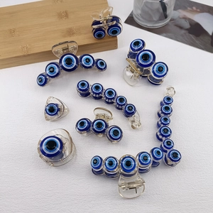 8-piece set of transparent Evil Eye hair clips including shark clips and side grips
