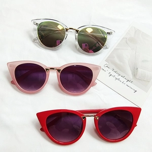 Vintage cat-eye sunglasses with oval metal bridge and colorful frames in three shades