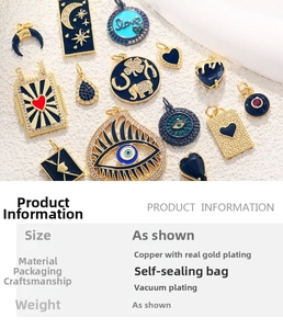 Detail of 18K gold plated charms with evil eye, heart and elephant on white background