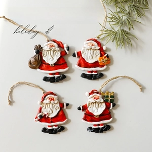 Set of four assorted Santa Claus ornaments with rustic ropes for Christmas tree decor