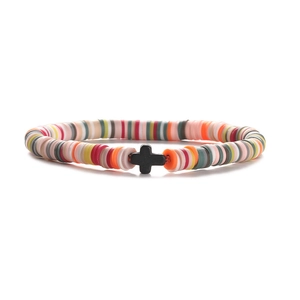 Close-up of 6mm colorful Heishi clay bead bracelet with a black cross pendant detail