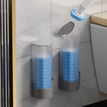 Wall-mounted transparent storage box with grey base for blue toilet cleaner blocks