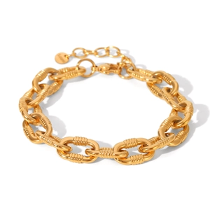 Detail of 18K gold plated chunky chain bracelet with textured twisted rope links