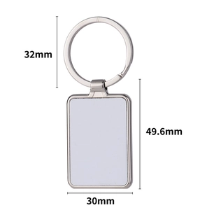 Macro view of silver heat transfer keychain with detailed 49.6mm x 30mm dimensions