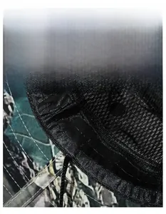 Detail view of the widened sweatband design and breathable mesh lining on camo boonie hat