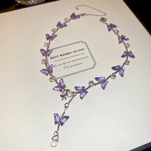 Elegant purple crystal butterfly drop pendant necklace with silver bead accents for women