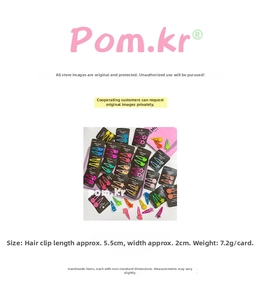 Detailed view of candy-colored cartoon hair clips measuring 5.5cm by 2cm on black card