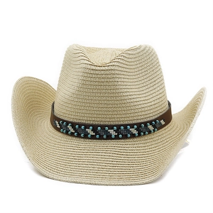 Detail of beige straw cowboy hat featuring wide brim and ethnic beaded decorative band