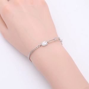 Detailed close-up of a 925 sterling silver bracelet featuring square zircon on a wrist