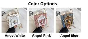 Detailed view of Baroque angel relief and floral motifs on vintage chain handbags
