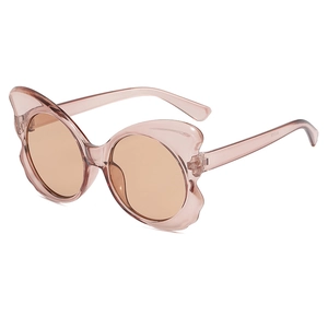 Pink butterfly oversized sunglasses with brown lenses in a modern retro fashion style