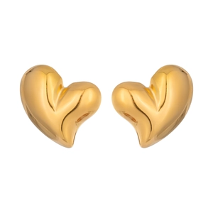 Detailed view of 3D gold heart earrings with polished mirror finish for women