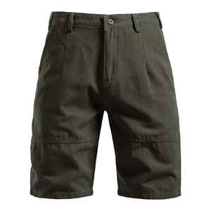 Detailed view of heavy stitching and durable cotton canvas texture on cargo shorts