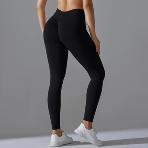 Detail view of seamless black yoga leggings with V-waist and scrunch butt design