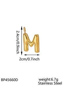 Detail view of 14K gold plated letter M pendant with precise size and weight measurements