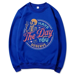 Dark blue crewneck sweatshirt with retro skull graphic and Have The Day You Deserve text