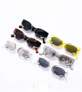 Detailed view of six colors of cat eye sunglasses with metal snake ornaments
